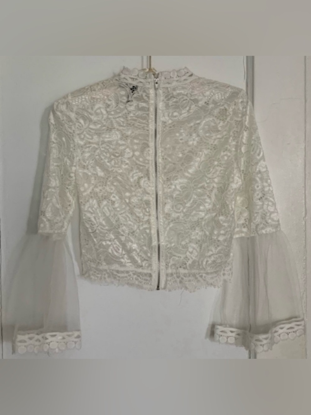 White Lace Sheer Bell Sleeves Crop Top
Blouse - Picture 6 of 14